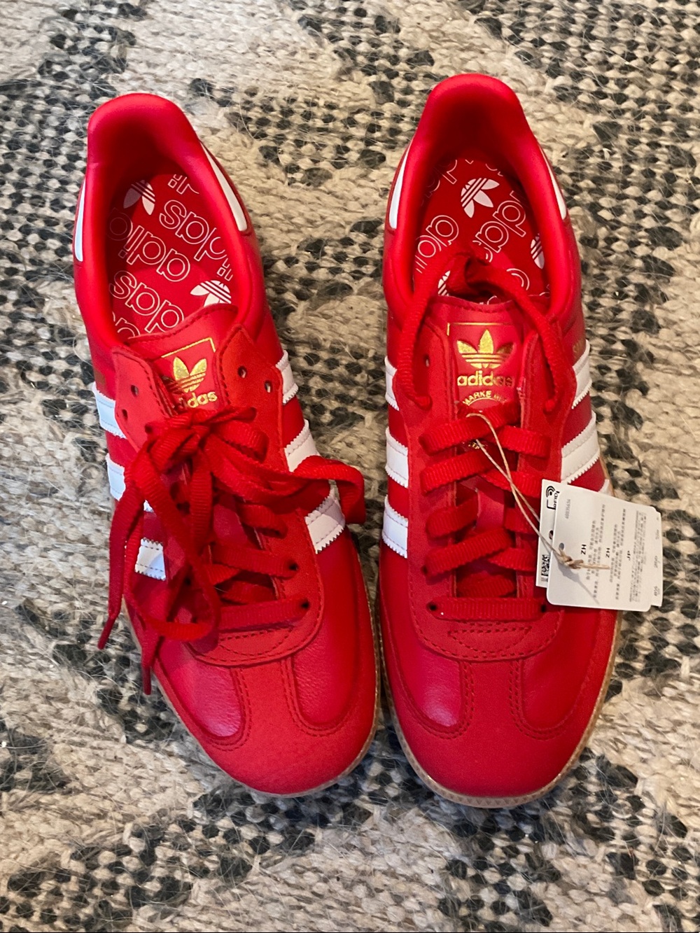 adidas Red Sneakers with White Stripes and Gold Trefoil